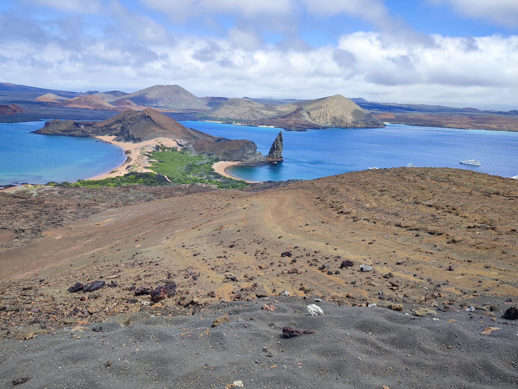 Panorama of Bartolomé Island with Pinnacle Rock in the Galápagos, taken by Oleg and Natalia.