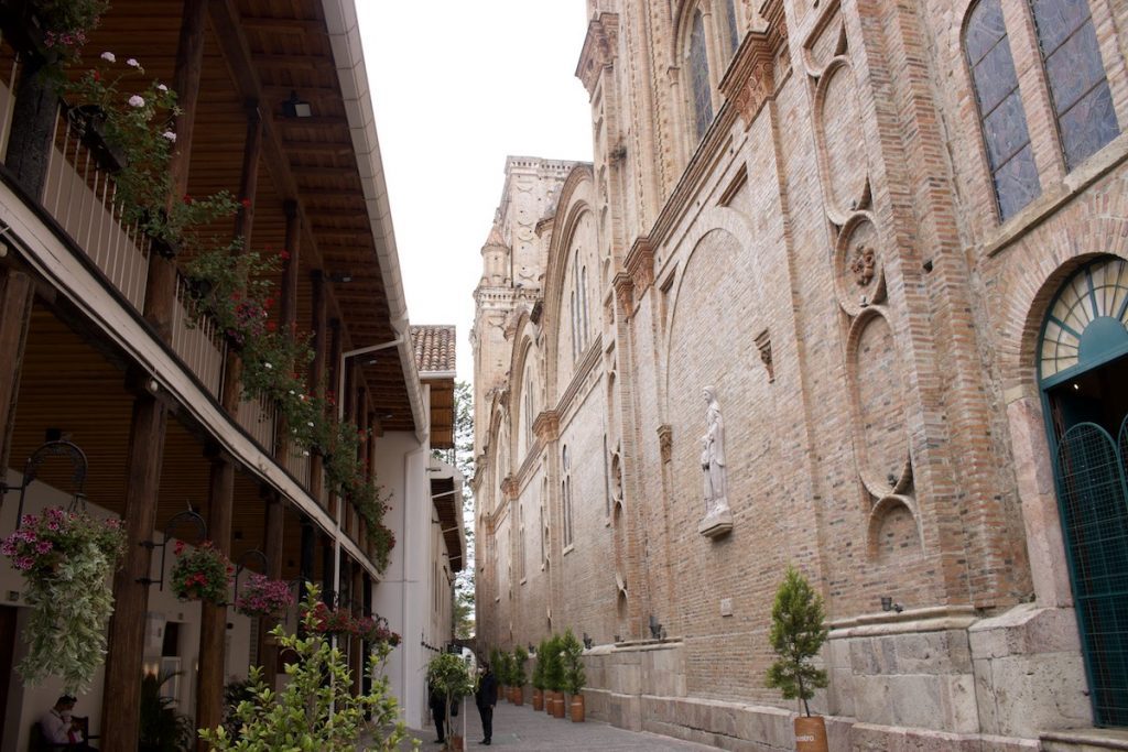 Walking through historical street in Cuenca Ecuador