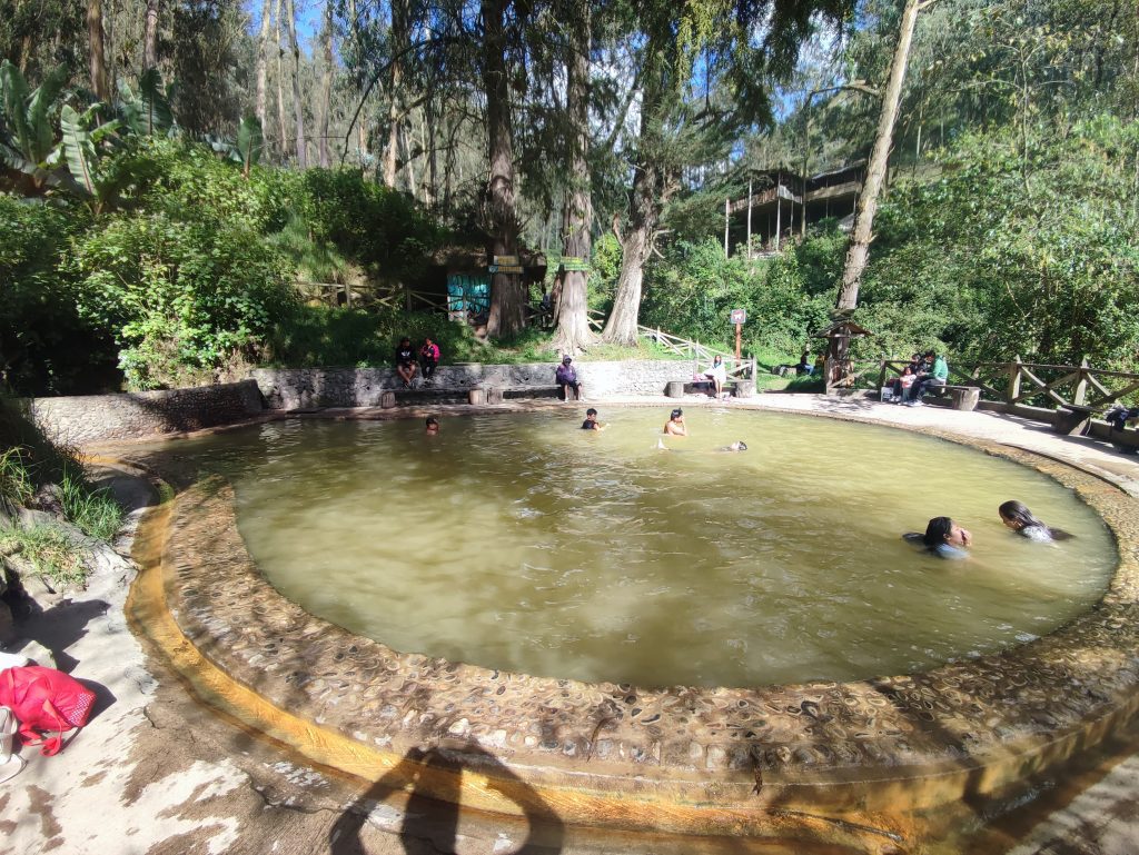 Local community in the natural bath on the way to Peguche waterfalls in Otavalo