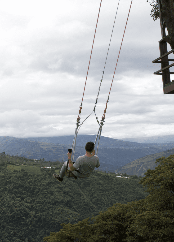 Swing at the End of the World in Banos, Ecuador