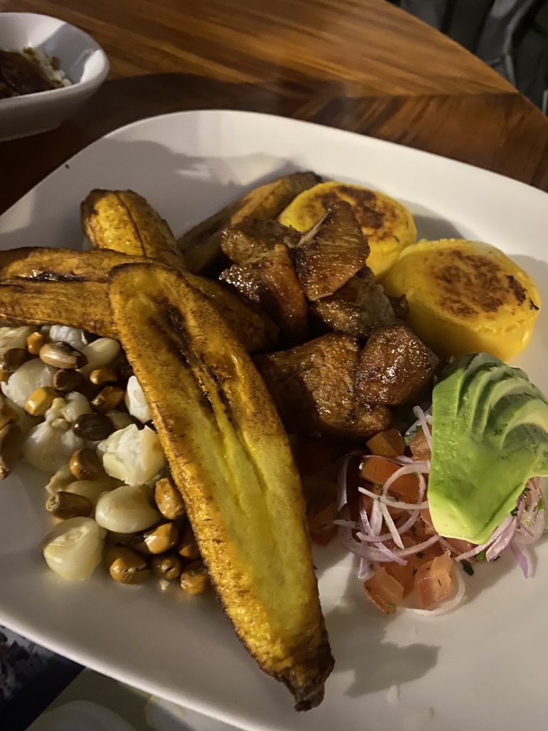 Trying Fritada Criolla during the travel on Ecuador