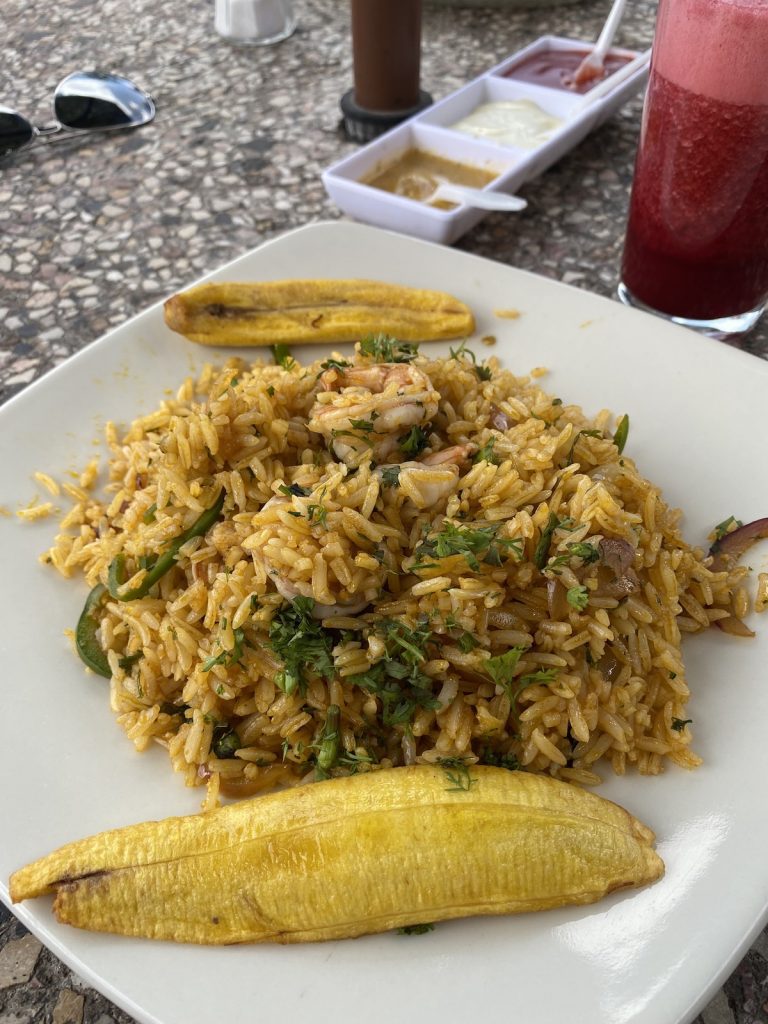 Trying Arroz con Camarones in Ecuadorian restaurant