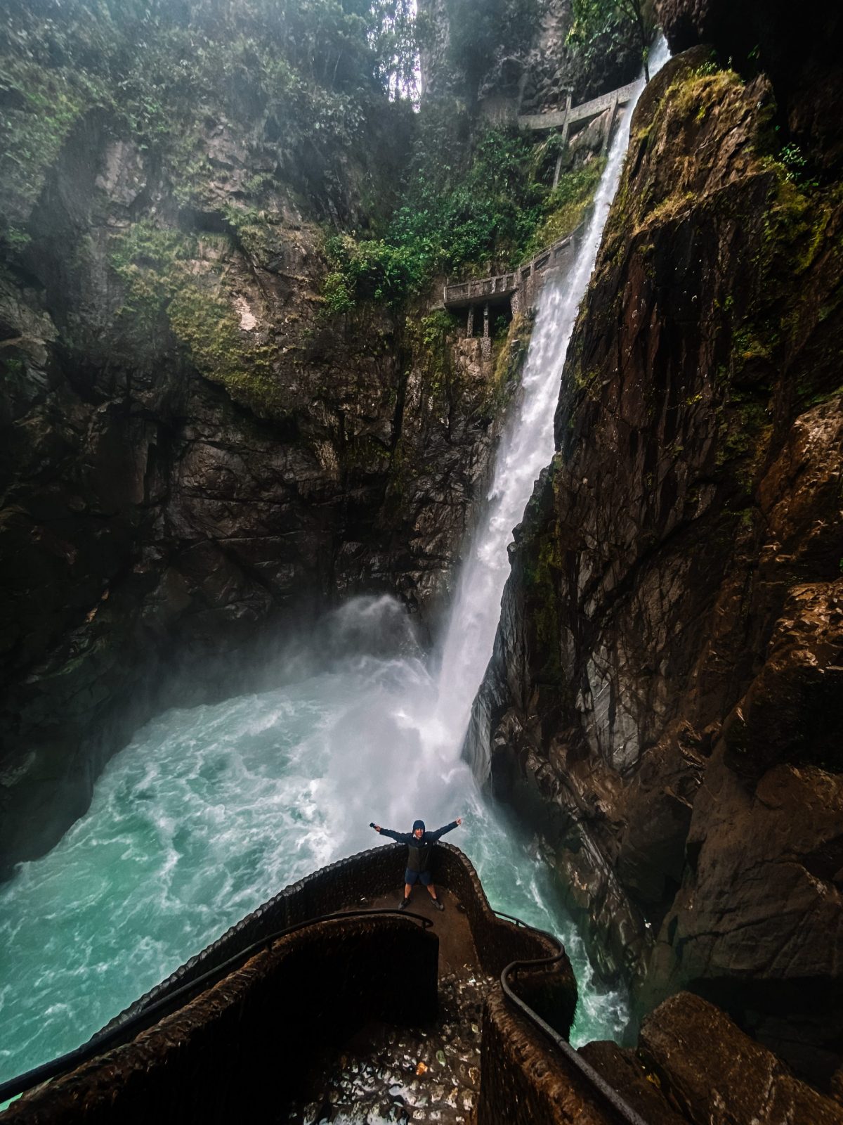 at the front Pailon del Diablo Waterfall in Banos Ecuador
