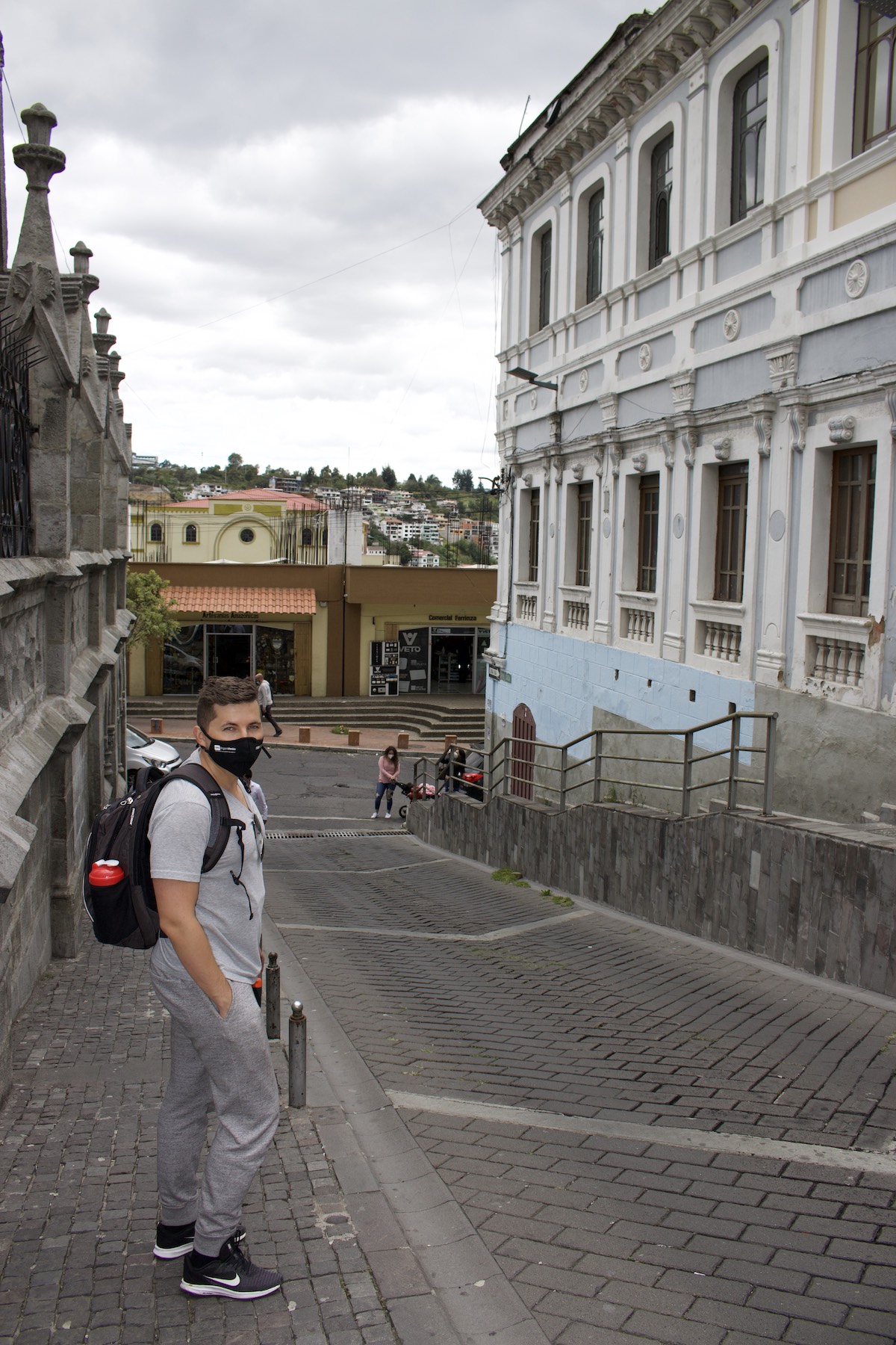 I am walking through Quito's historic district blocks