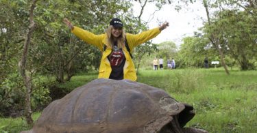 Giant Galapagos turtle at the La Caseta part of El Chato with my wife behind
