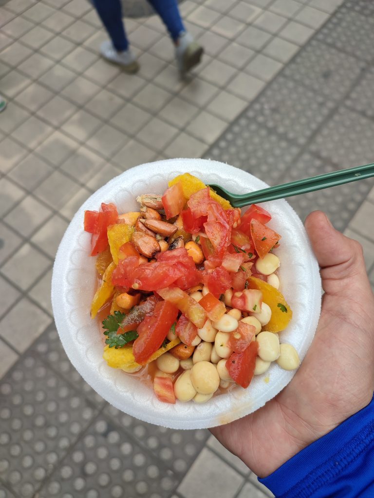 Trying cevichocho vegano at Ecuador street food market