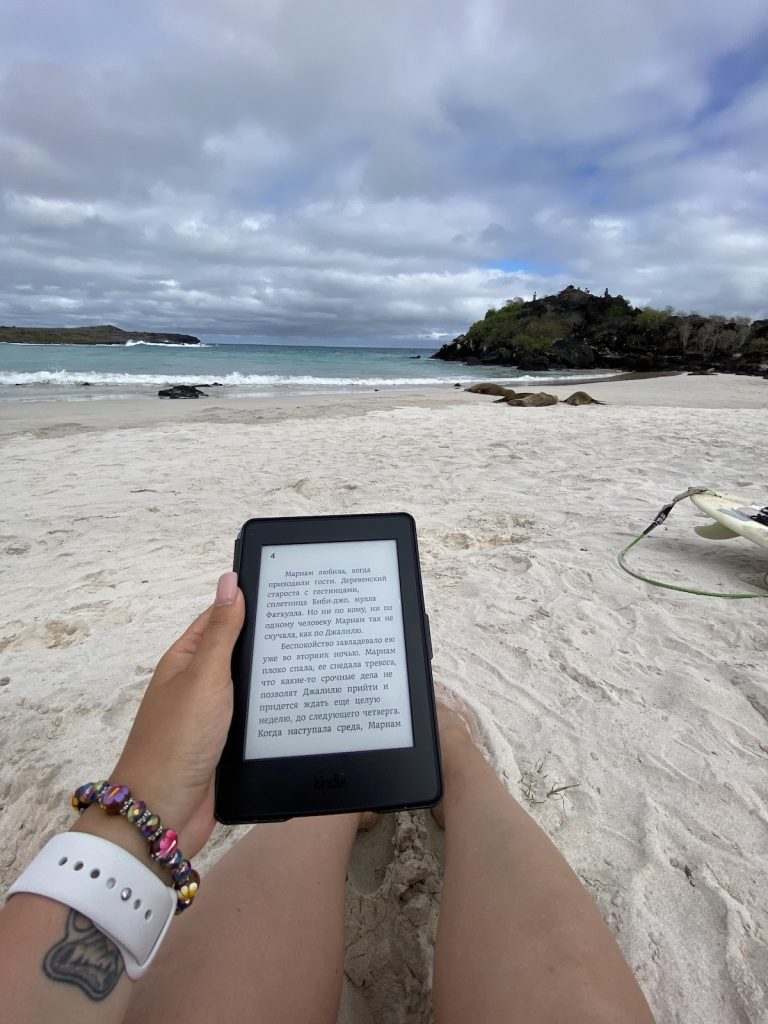 reading e-book at puerto chino beach