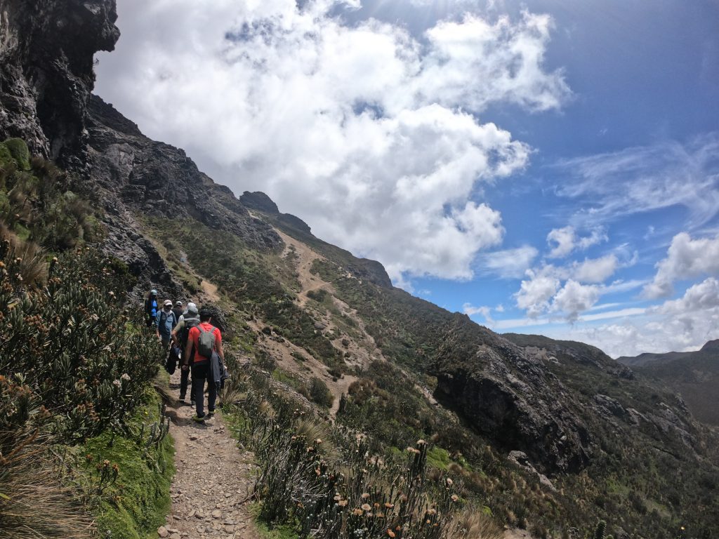 Group of people hike to Going up to Rucu Pichincha volcano in Quito