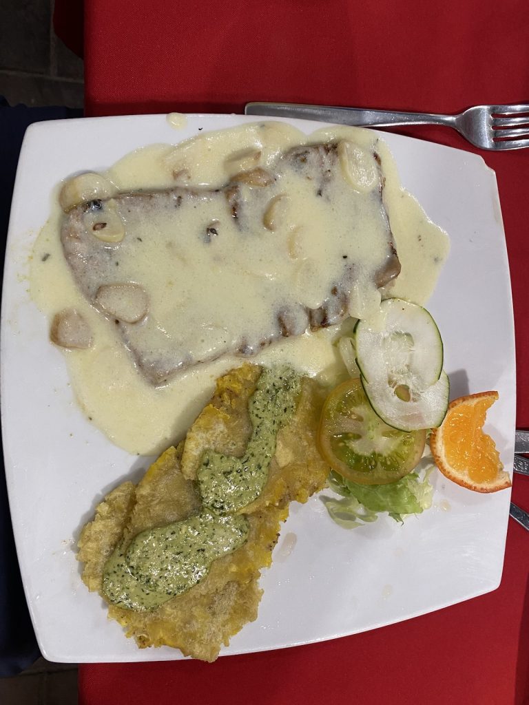 EAting Grilled fish in Quito restaurant
