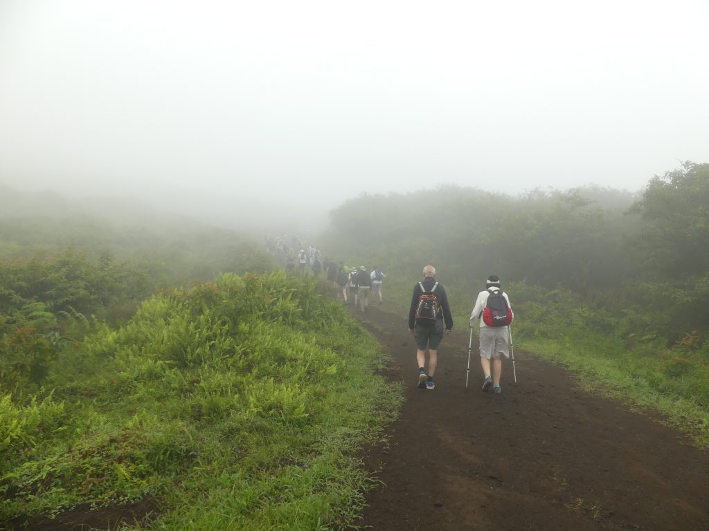 Doing trekking with guide at Sierra Negra Volacno, Galapagos 