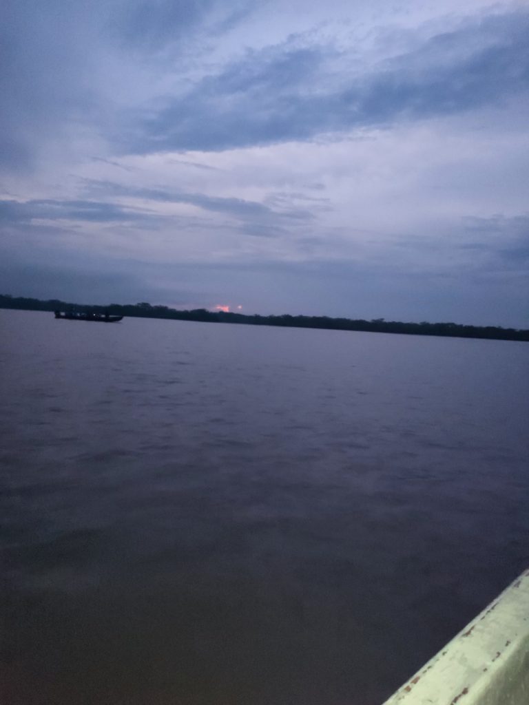 Riding through Amazon river on Ecuador