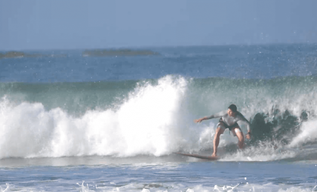  I am surfing in Manta, Ecuador