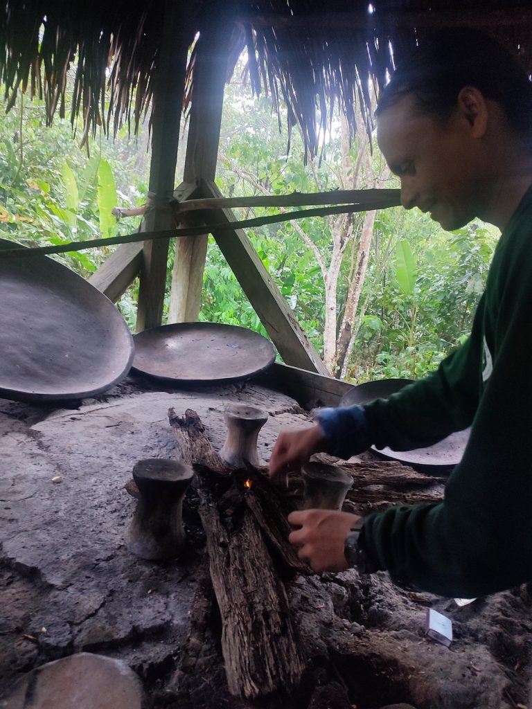 Taking a cooking class from Siona community people at Cuyabeno Reserve